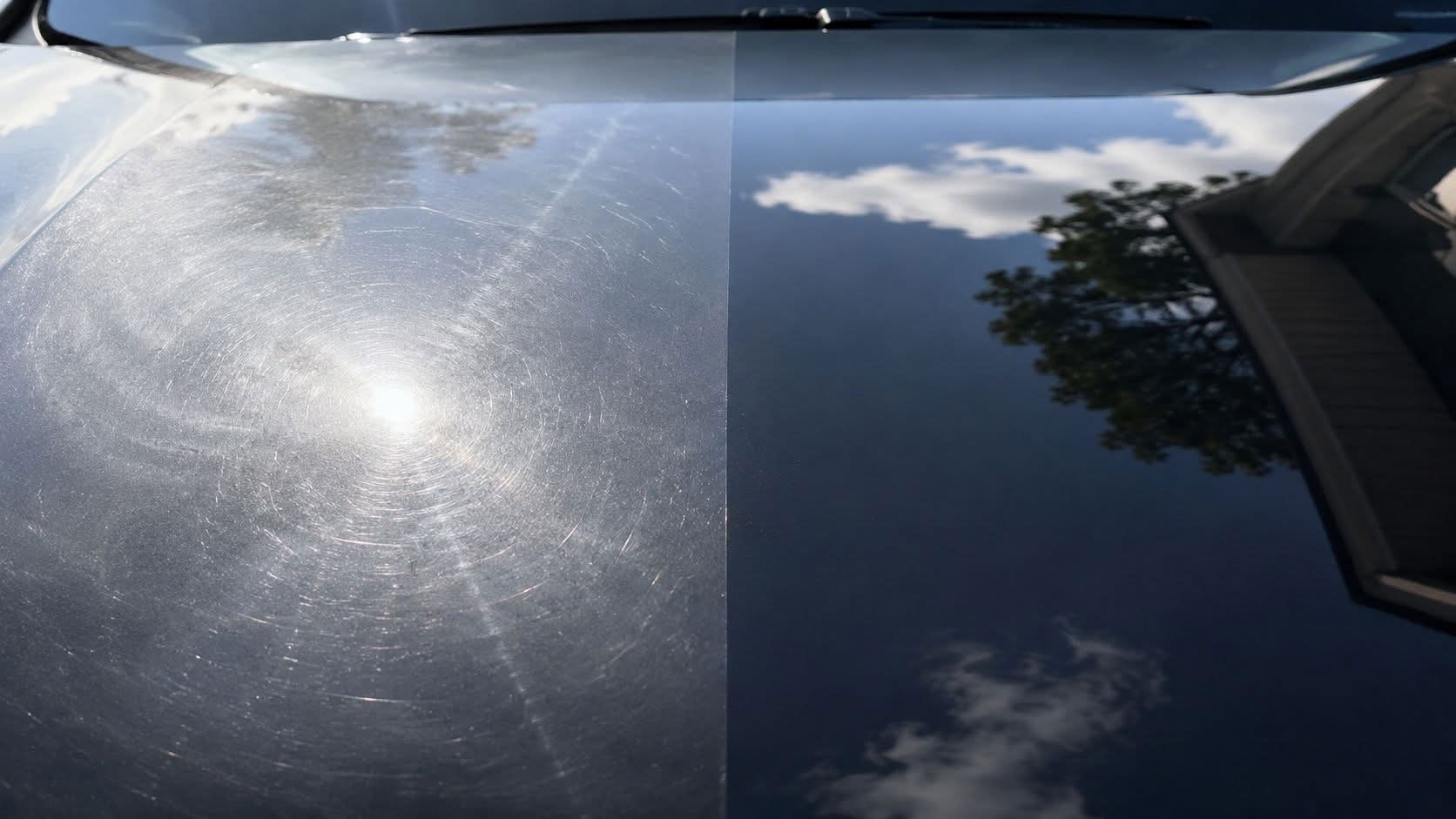 A car hood showing a clear difference between a scratched side and a polished, shiny side.