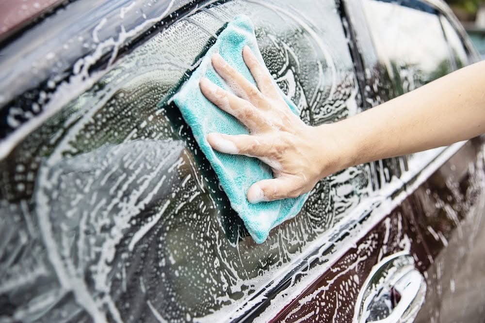 man-wash-car-using-shampoo-scaled-1-1 (1)